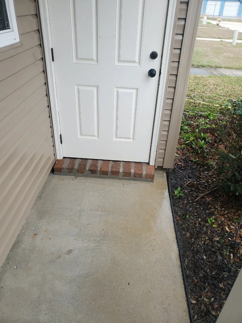 The same concrete entry by the front door after washing