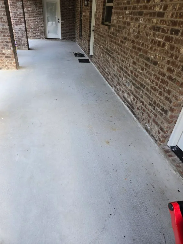The same covered brick porch after washing