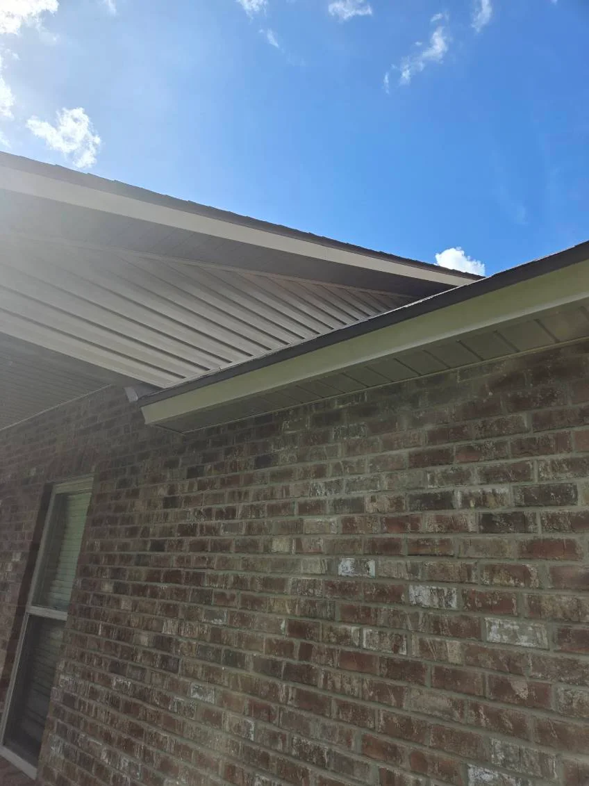 The same roof edge and gutter after washing