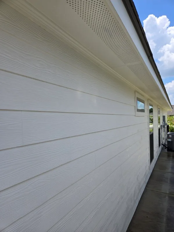Clean siding, soffit and perforated eave